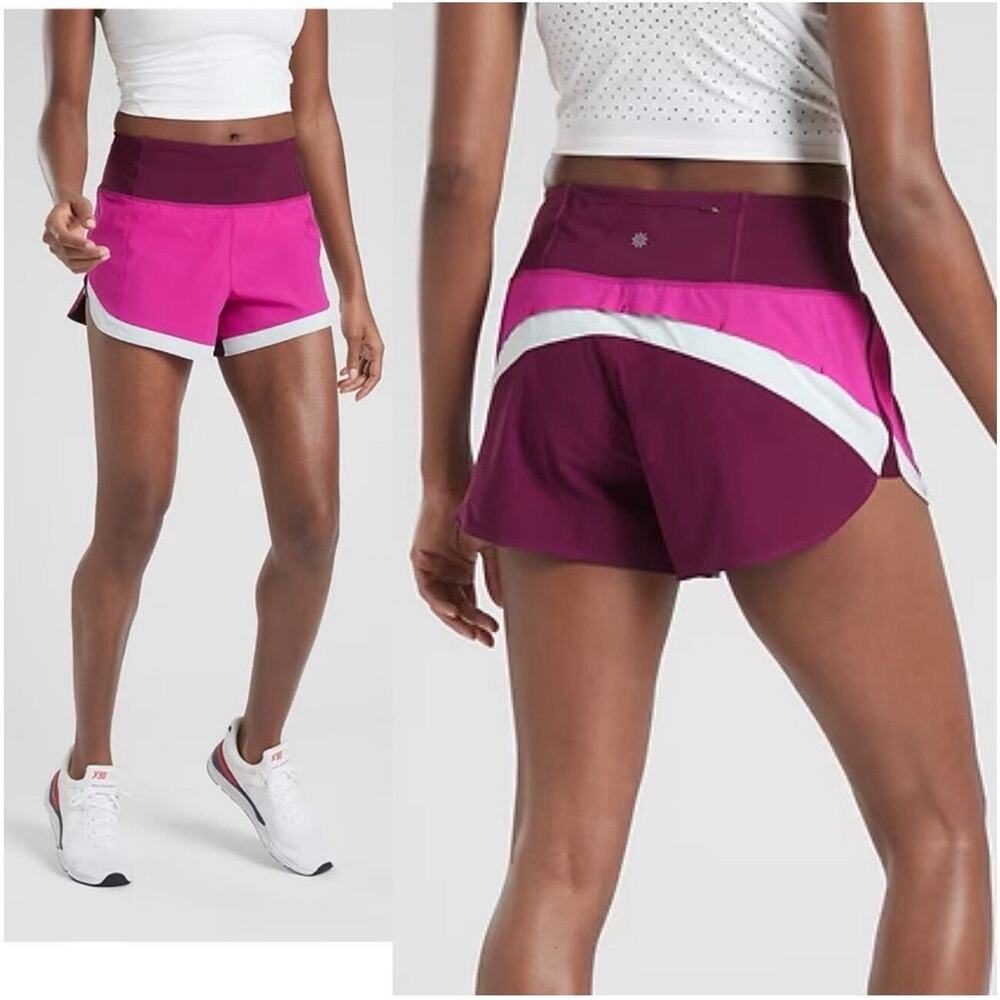 Athleta Running Free Colorblock 3.5"Womens Shorts M Purple Zip Pocket Lined Logo